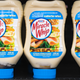 Kraft Miracle Whip on a store shelf, salad dressing bottles placed upside down in a row